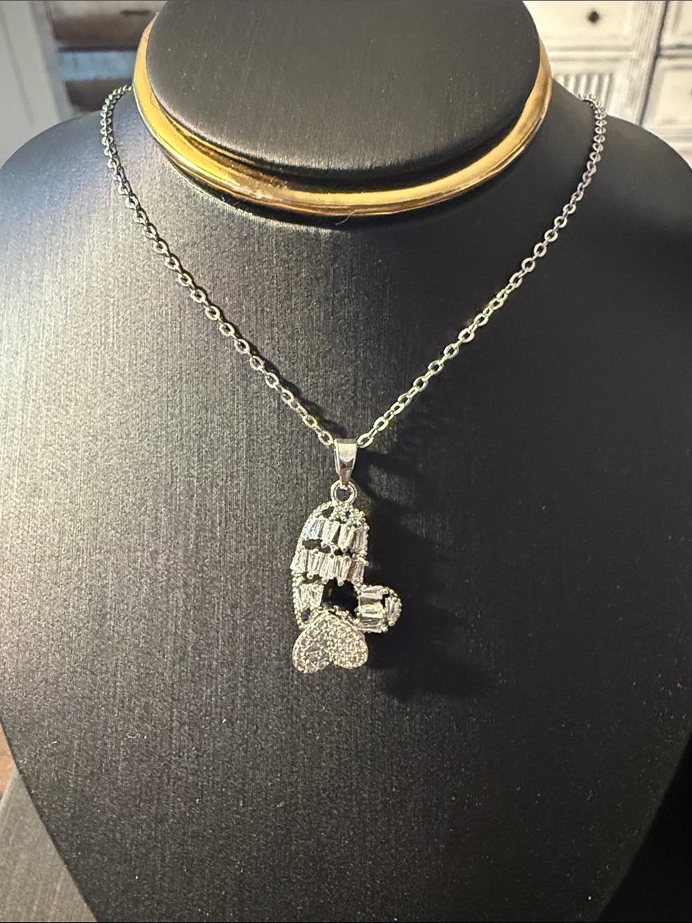 Sparkling iced-out spinning heart pendant Baguette Necklace Stainless Steel